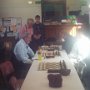 Paul's surname is  Power but it's his opponent, David Gleeson, who is glowing! Meanwhile Camm plays Cook as Czuczman - Watson look on.